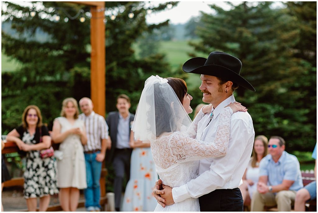 Bride and groom first dance outside at Deer Creek Valley Ranch