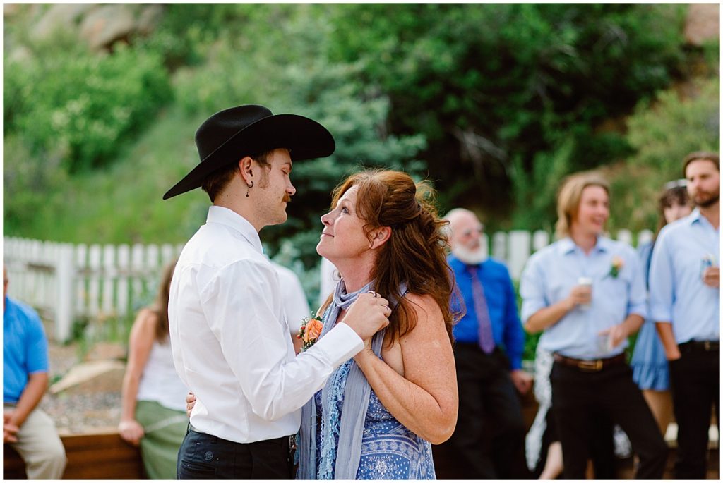 Mother and groom dance outside at Deer Creek Valley Ranch