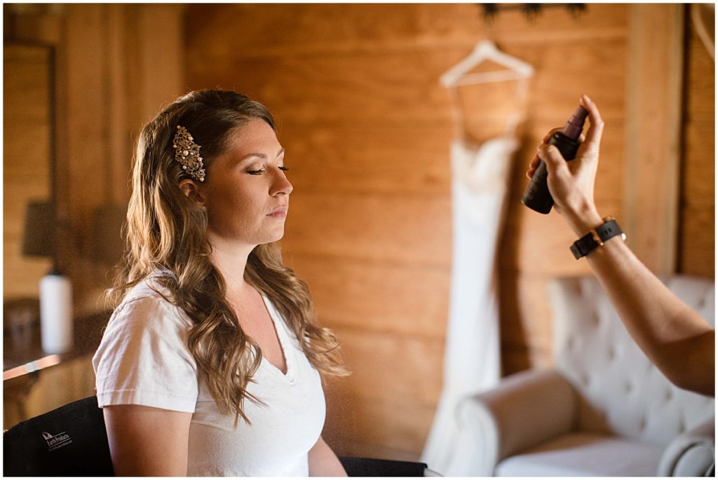 Bride getting hair and makeup done by Jaded Beauty at Piney River Ranch in Vail.