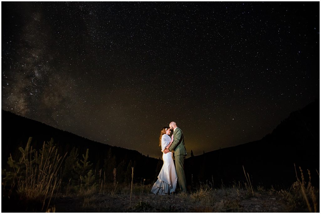 Bride and groom at Piney River Ranch in Vail at night