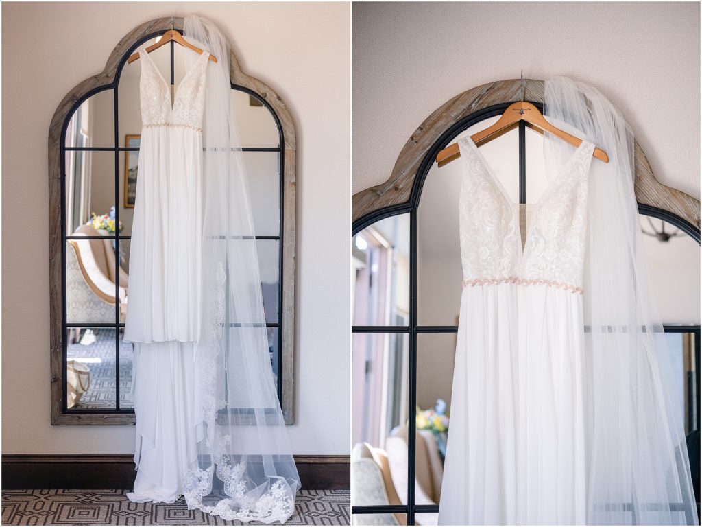 Bride's dress hanging for wedding at Columbine Country Club