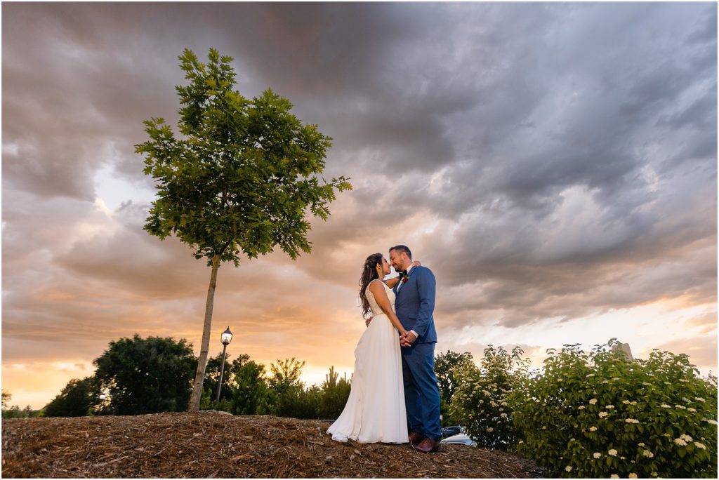 Bride and groom outside at Columbine Country Club
