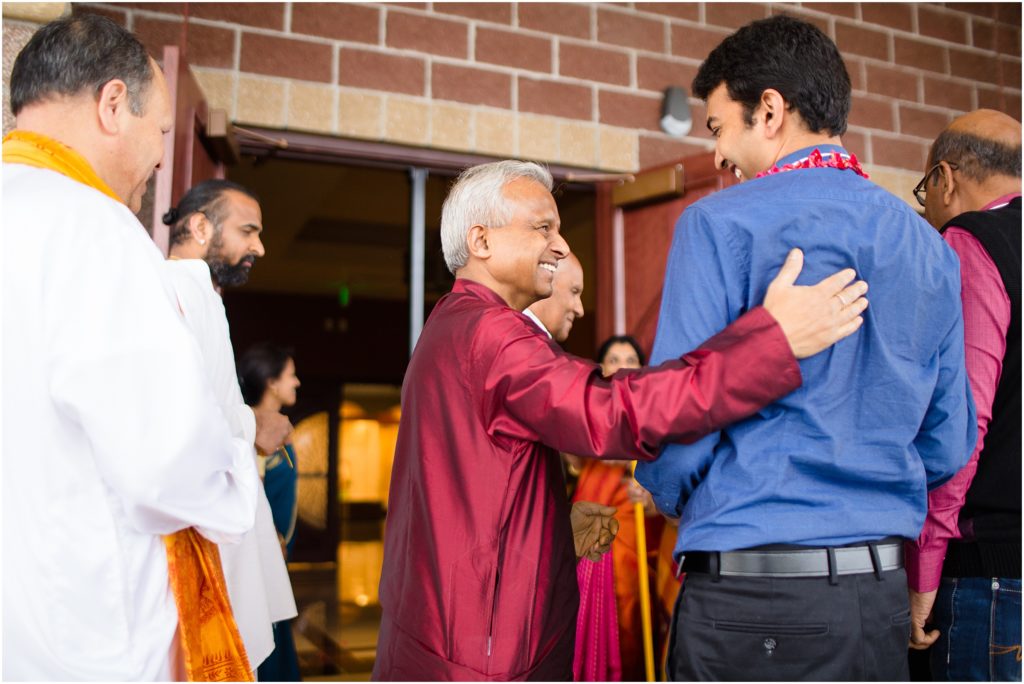 Groom greeting with guests at The Hindu Temple and Cultural Center of the Rockies