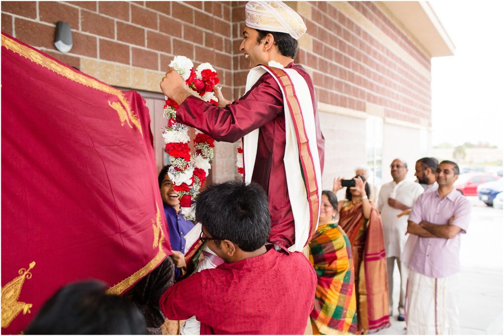 Groom lifted outside at The Hindu Temple and Cultural Center of the Rockies