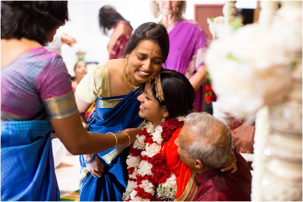 Bride meeting with guests during ceremony at The Hindu Temple and Cultural Center of the Rockies