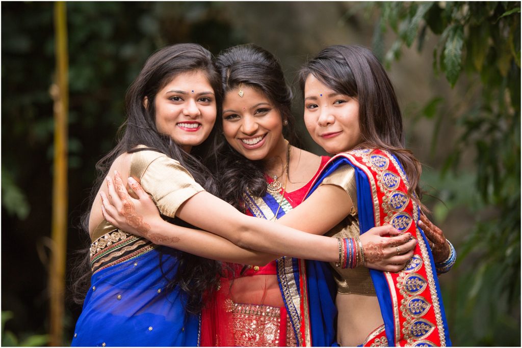 Bride with bridesmaids at Denver Botanic Gardens for Indian wedding reception