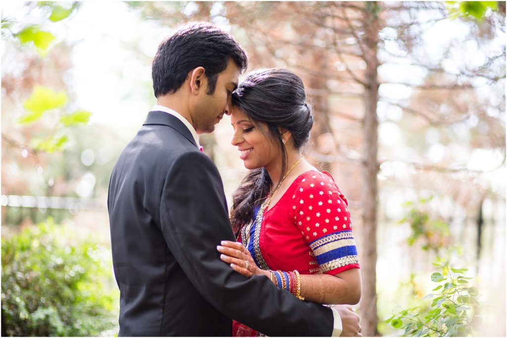 Bride and groom outside at Denver Botanic Gardens during Indian wedding reception
