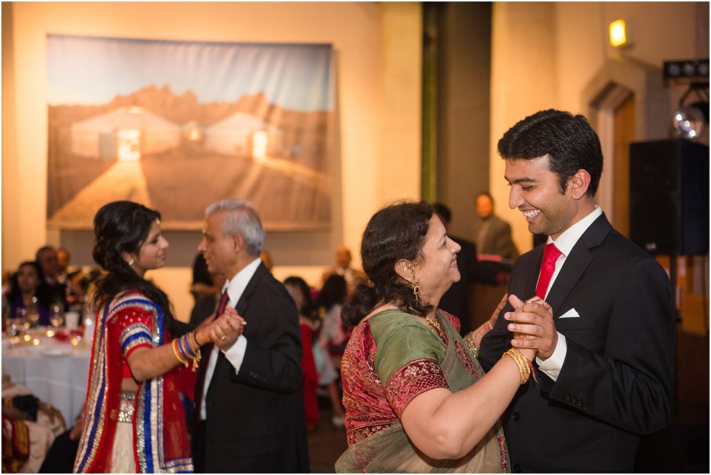 Mother son dance at Denver Botanic Gardens during Indian wedding reception