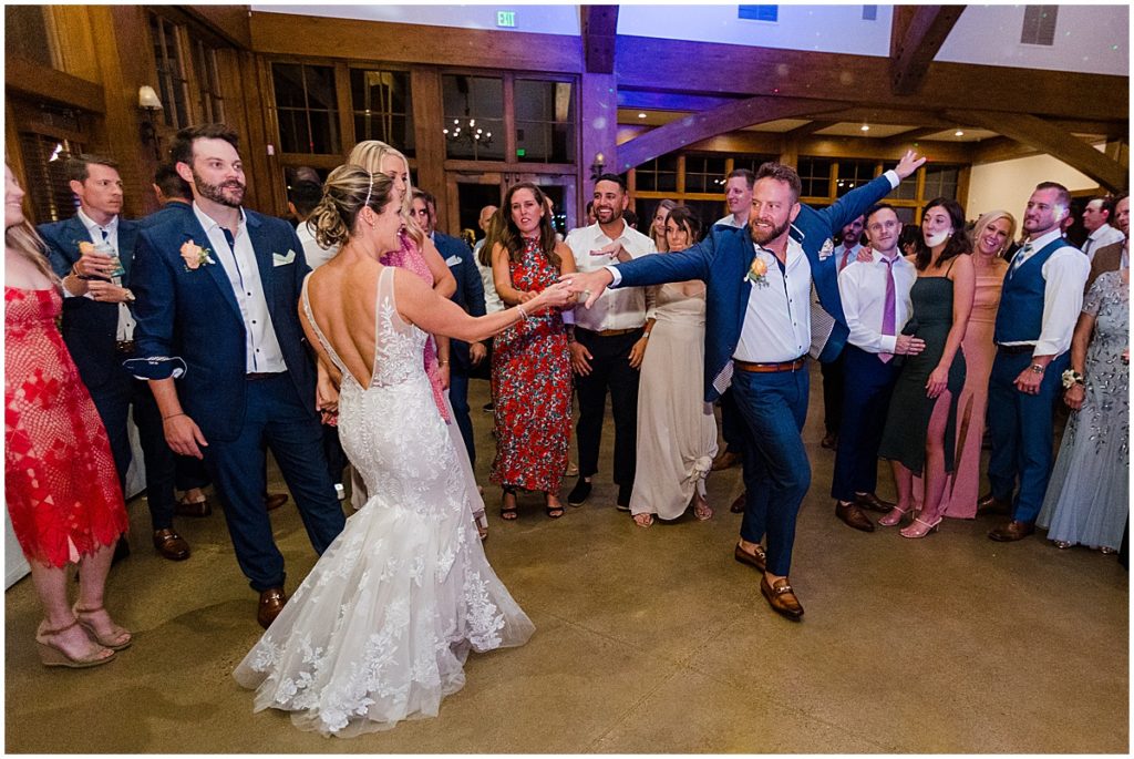 Bride and groom wedding reception dancing at Donovan Pavilion in Vail.