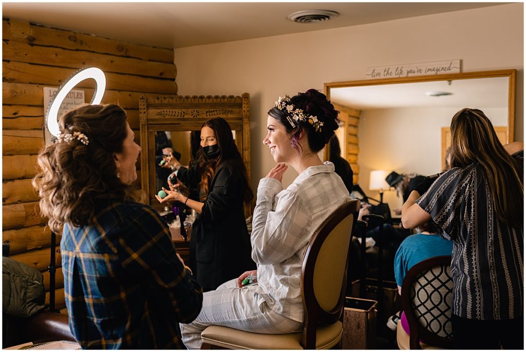 Bride getting hair and makeup done by Divine Beauty Artists at Keystone Ranch