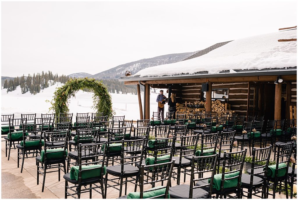Floral decor designed by Bloom Flower Shop for outdoor winter wedding at Keystone Ranch.