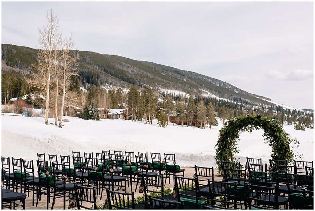 Floral decor designed by Bloom Flower Shop for outdoor winter wedding at Keystone Ranch.