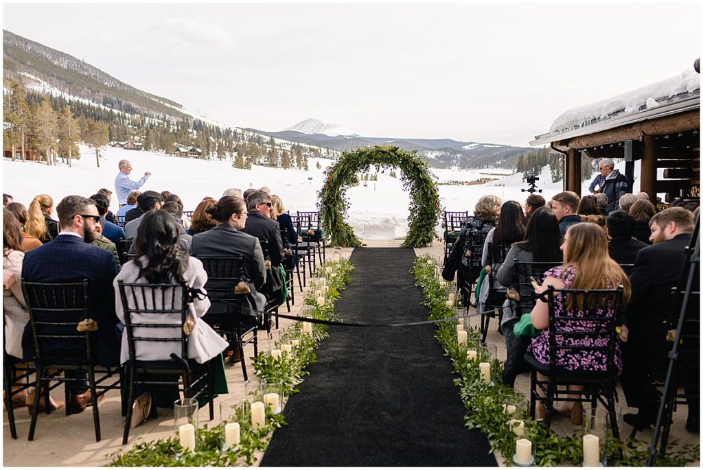 Guests seated for wedding outside at Keystone Ranch