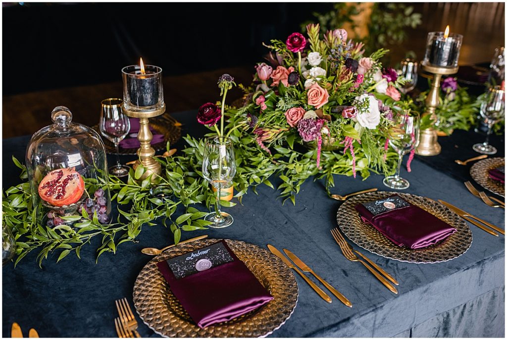 Reception table at Keystone Ranch.  Rentals provided by Colorado Tents and Events.  Floral design by Bloom Flower Shop.