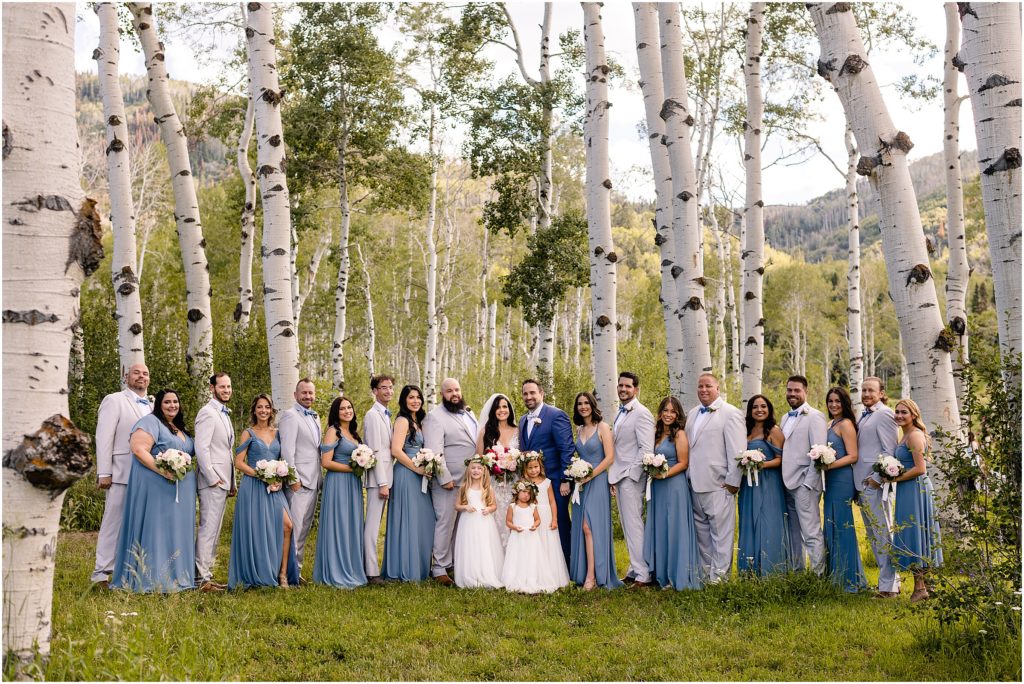 Bridal party under aspen trees at Flying Diamond Ranch in Steamboat Springs