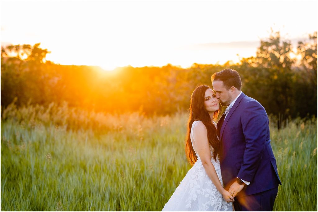 Bride and groom outside during sunset after wedding ceremony at Flying Diamond Ranch in Steamboat Springs