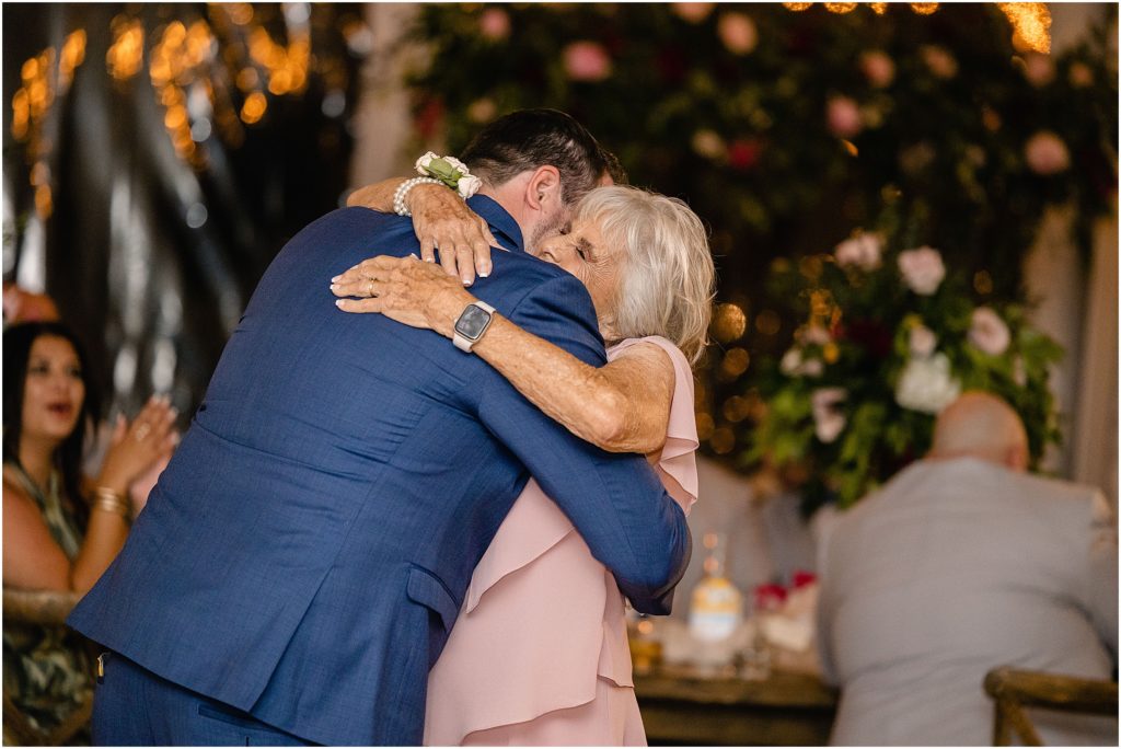 Grandmother and grandson hug 
