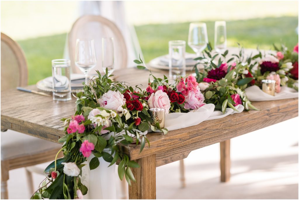 Wedding reception with floral design by We Plus You