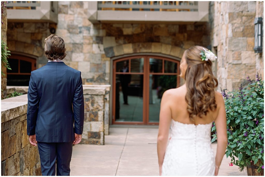 Bride and groom first look at Four Seasons Vail