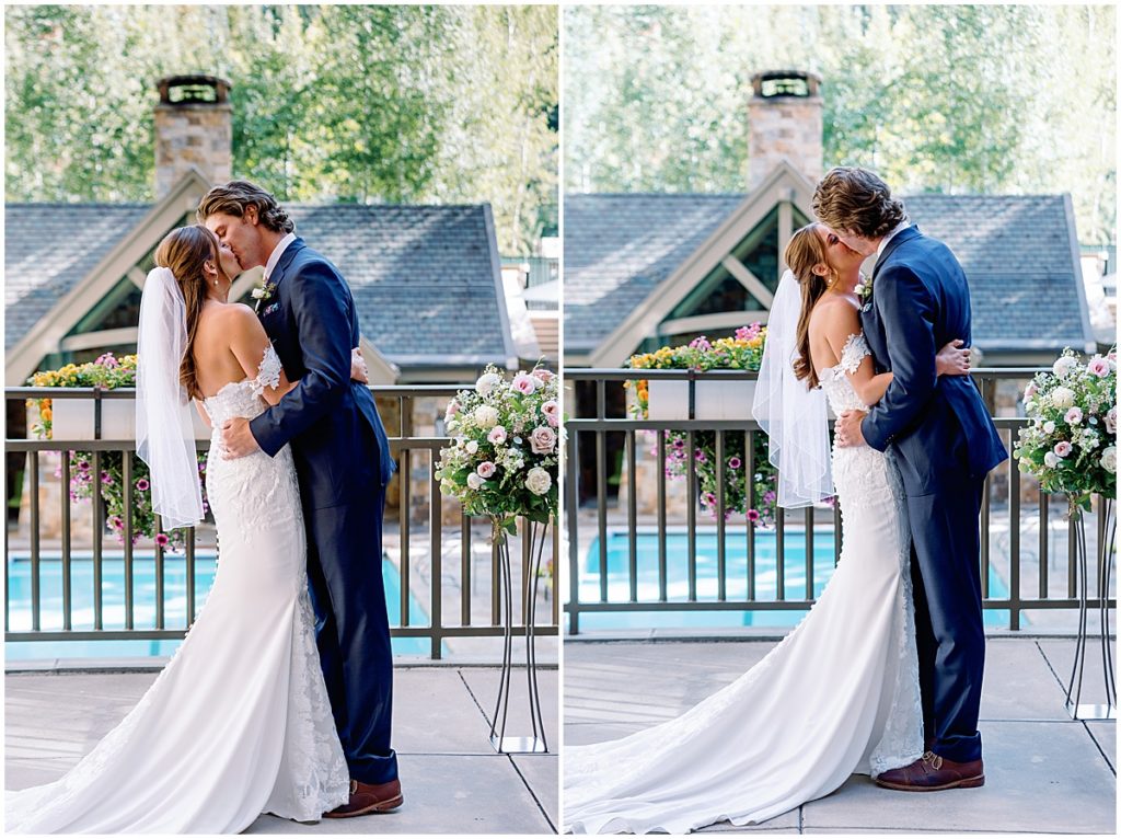 Bride and groom kiss at end of wedding ceremony