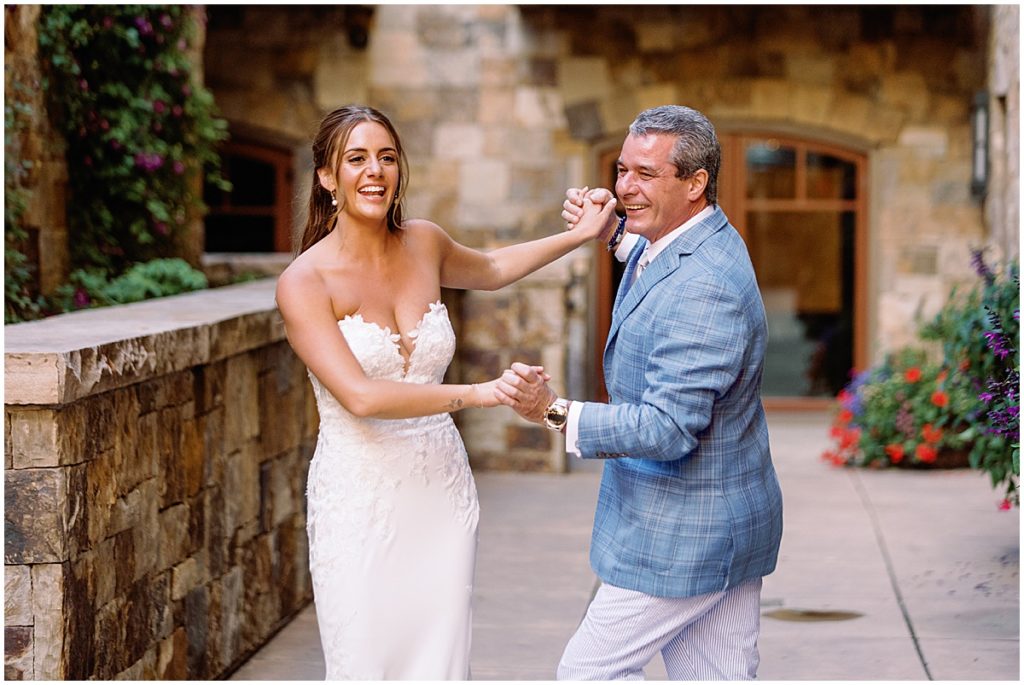 Father and bride outside for first dance at Four Seasons Vail.