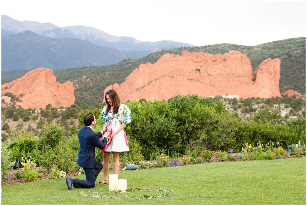 Down on one knee proposal at Garden of the Gods