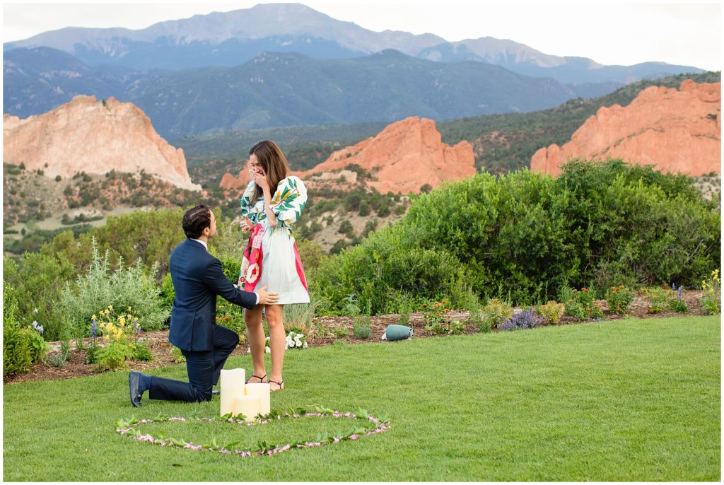 Down on one knee for proposal at Garden of the Gods