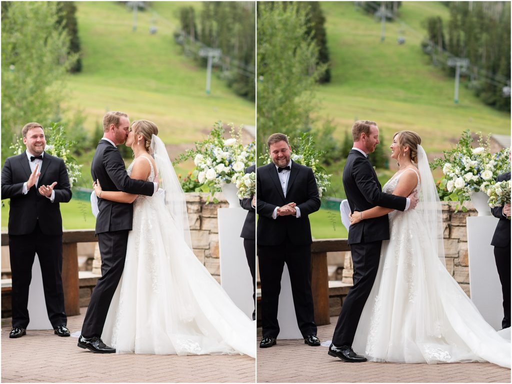 Bride and groom kissing at the end of wedding ceremony in Beaver Creek Park Hyatt