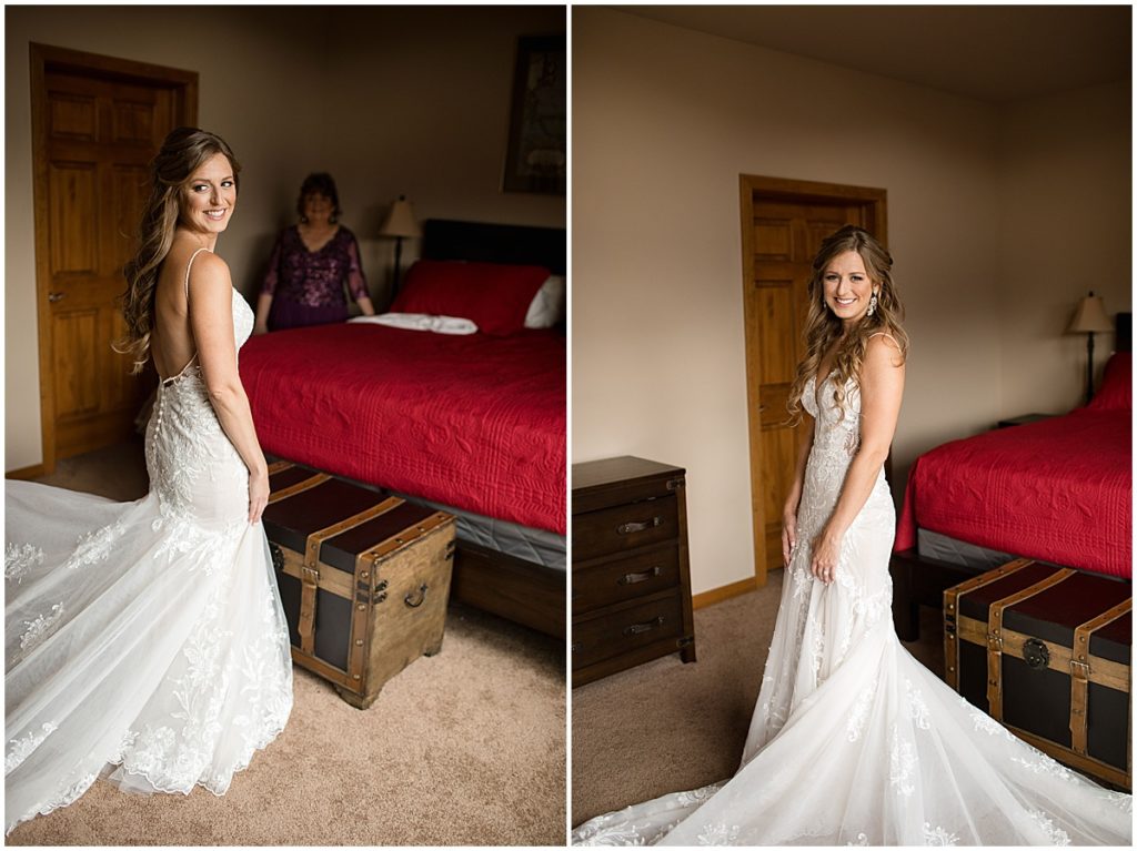 Bride getting wedding dress on from Town and Country Bridal