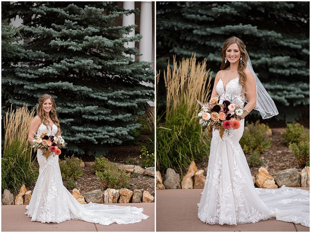 Bride wearing wedding dress from Town and Country Bridal holding bouquet by Lace and Lilies Flowers.