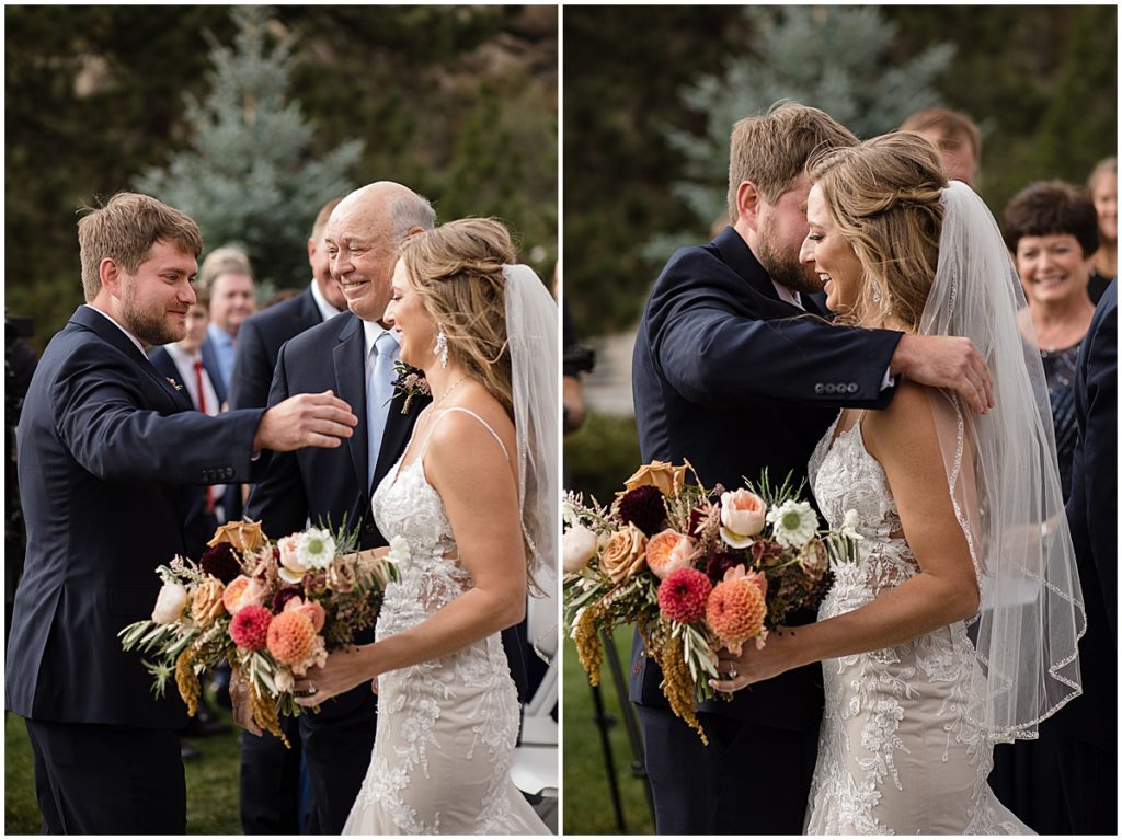 Bride and groom during wedding ceremony at the Stanley Hotel in Estes Park. Bride with bouquet from Lace and Lilies Flowers. 