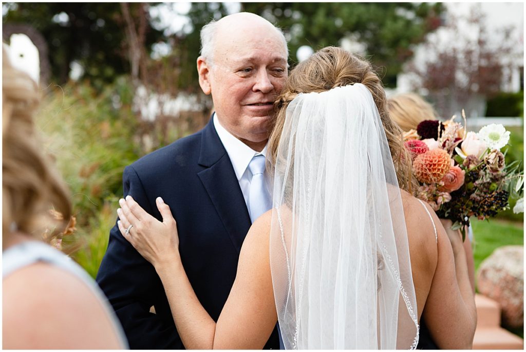 Bride and dad after wedding ceremony at the Stanley Hotel in Estes Park.