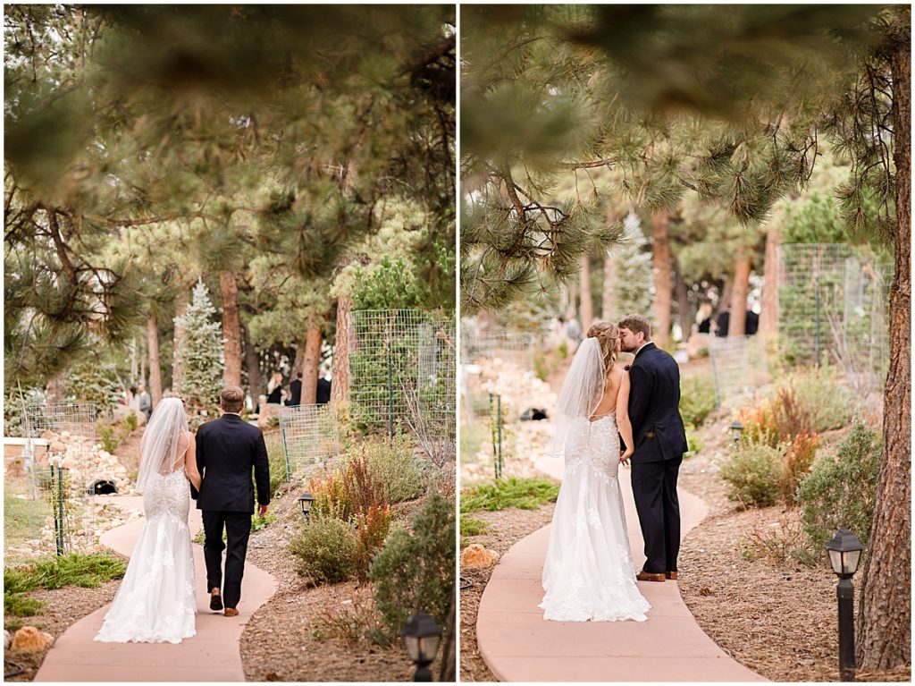 Bride and groom outside at the Stanley Hotel in Estes Park.  Bride is wearing dress from Town and Country.  Groom wearing suit from Jos A Bank.