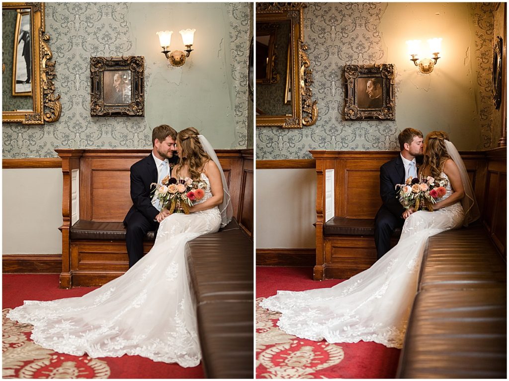 Bride and groom at the Stanley Hotel in Estes Park.  Bride is wearing dress from Town and Country Bridal holding bouquet from Lace and Lilies Flowers.  Groom wearing suit from Jos A Bank.