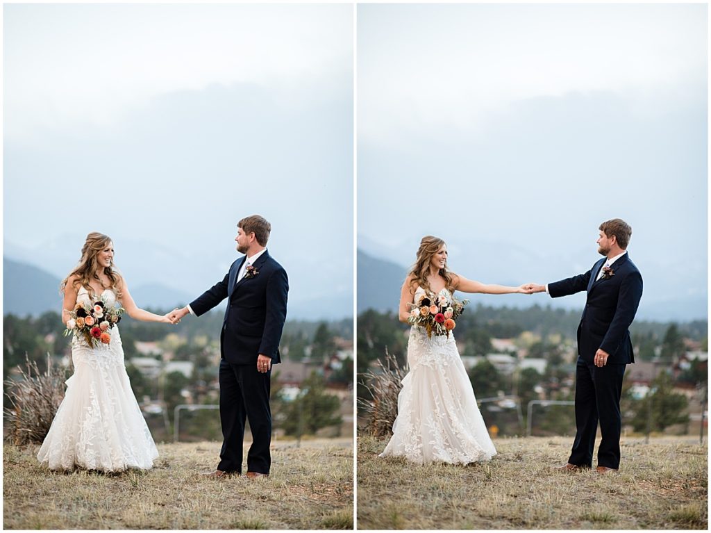 Bride and groom outside at the Stanley Hotel in Estes Park.  Bride is wearing dress from Town and Country Bridal holding bouquet from Lace and Lilies Flowers.  Groom wearing suit from Jos A Bank.