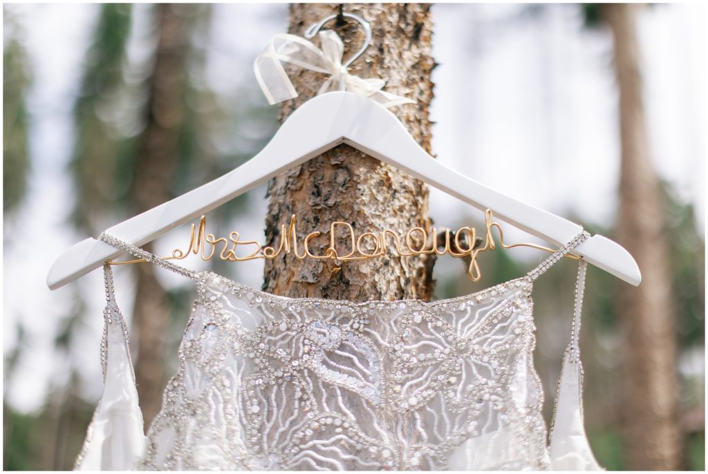 Bride's dress hanging at Grand Lake Lodge.