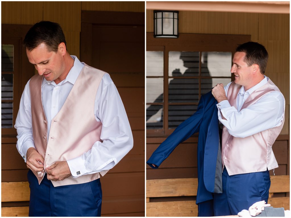 Groom putting on suit at Grand Lake Lodge.