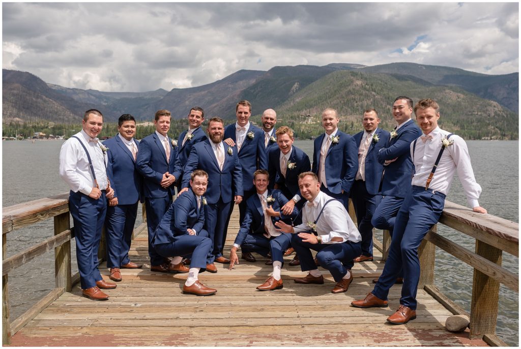 Groomsmen out on deck at Grand Lake