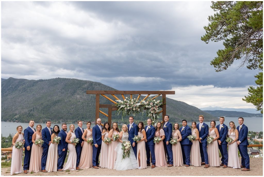 Bridal party outside overlooking Grand Lake
