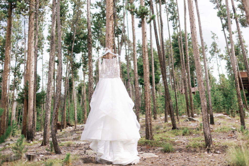 Bride's dress hanging at Grand Lake Lodge.