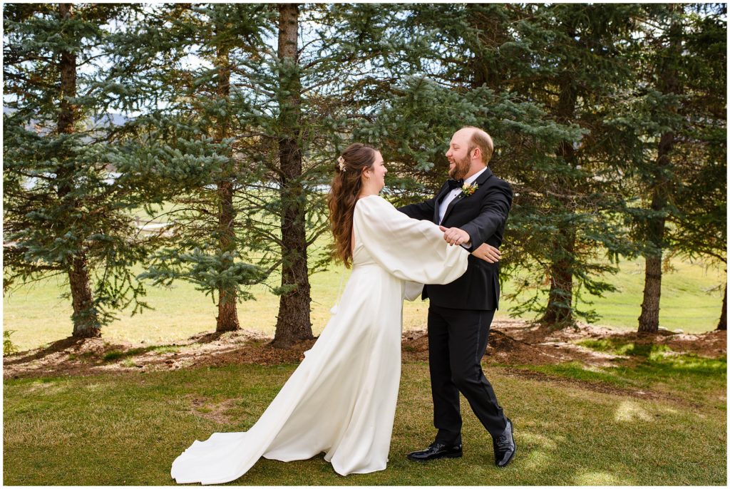 First look with bride and groom outside at Keystone Ranch