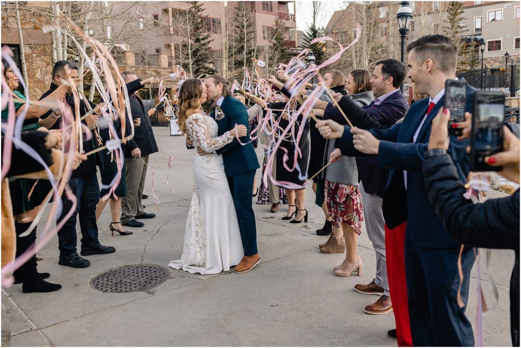 Bride and groom send off after reception outside quandary grill in Breckenridge