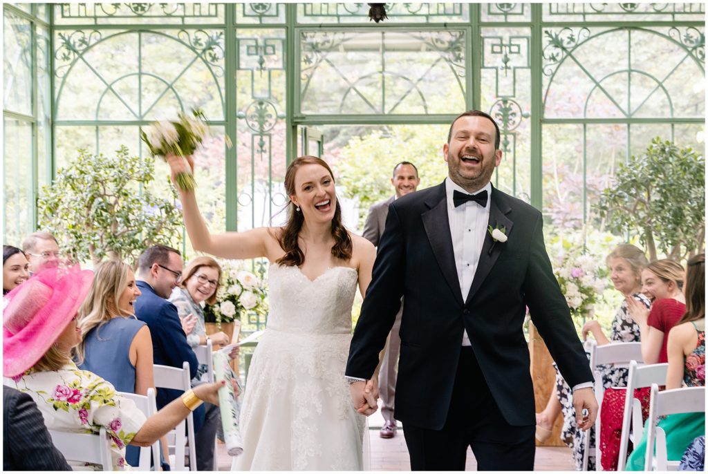 bride and groom celebrating getting married at denver botanic gardens