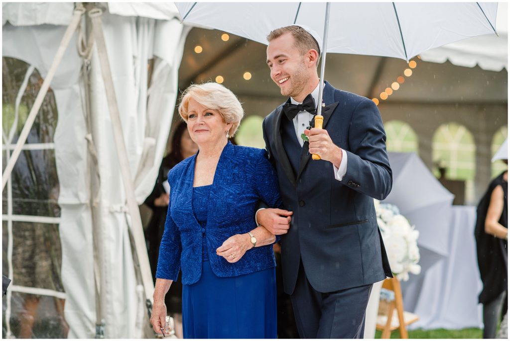 Groom walking down the aisle before wedding