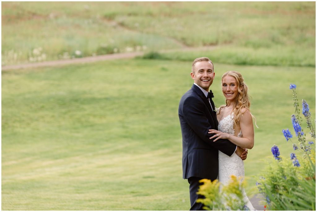 Bride and groom on lawn at Beaver C