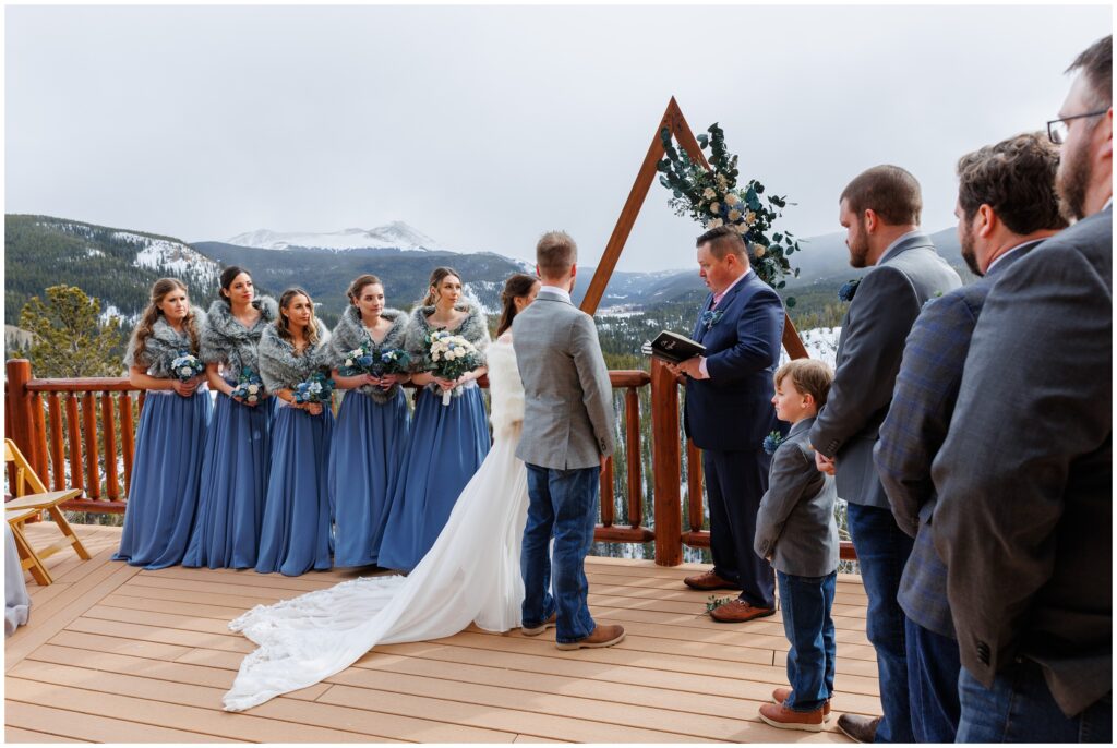 Bridesmaids standing on deck at The Lodge at Breckenridge