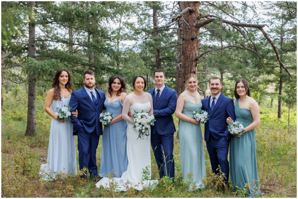 Bridal party and groomsmen together in the mountains of Larkspur