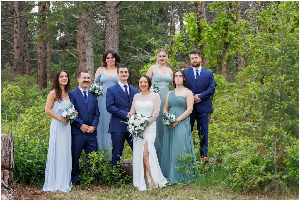 Bridal party and groomsmen together in the mountains of Larkspur