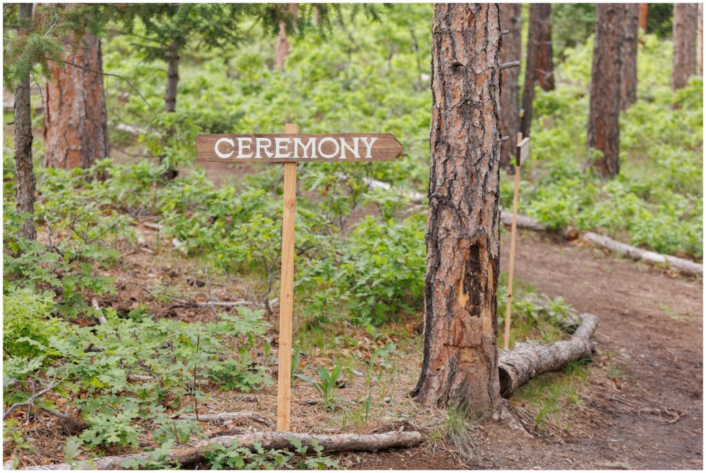 Sign pointing to ceremony spot in Larkspur mountains