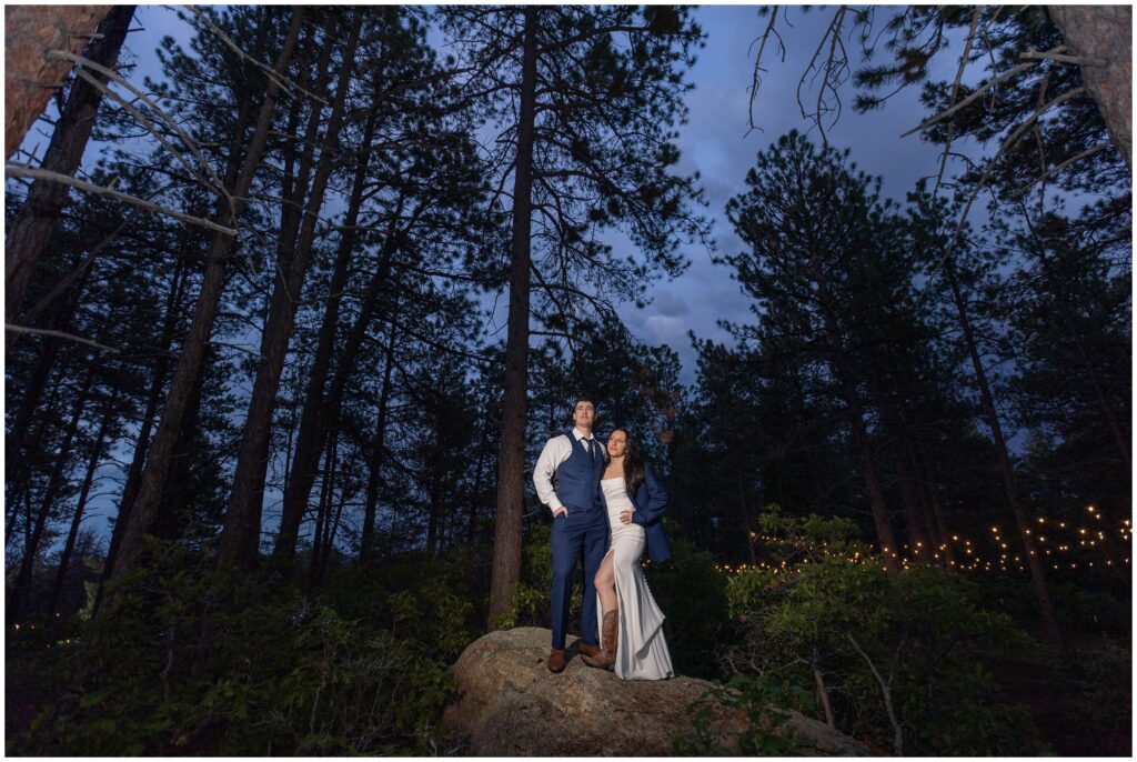 Bride and groom outside at night in Larkspur mountains